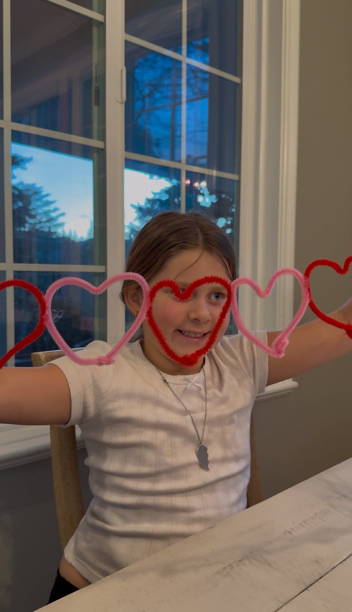 stay at home activity mom Valentine's Day craft for kids pipe cleaner heart garland