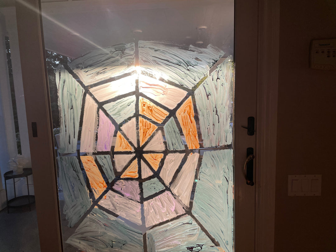 stay at home activity mom halloween outdoor art activities spider web tape resist art