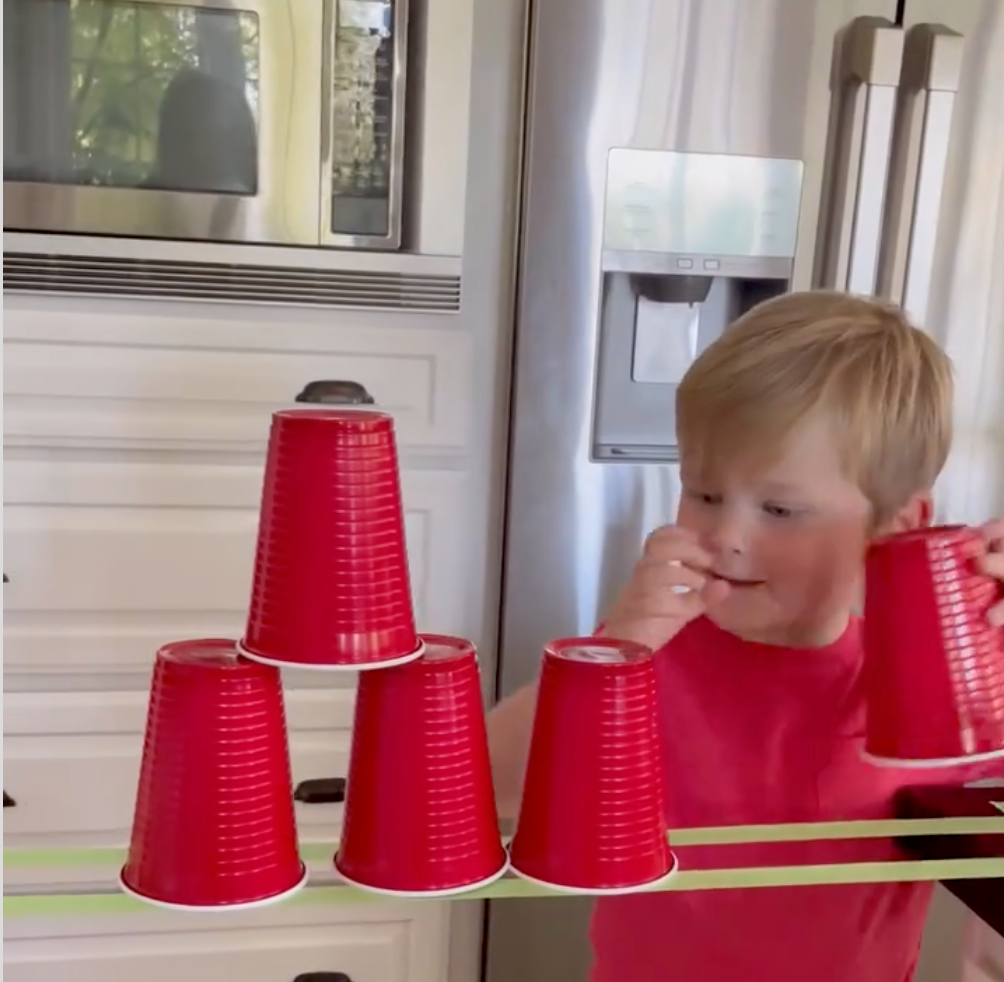 stay at home activity mom fine motor activities for toddlers cups balancing on tape